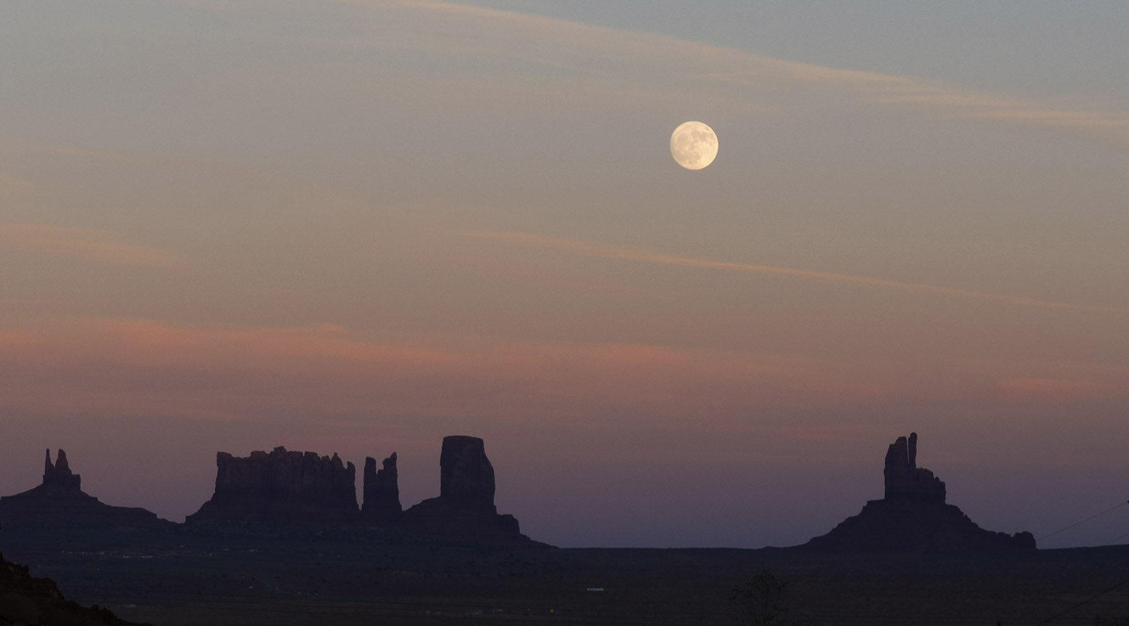 Moonrise over Monument Valley.