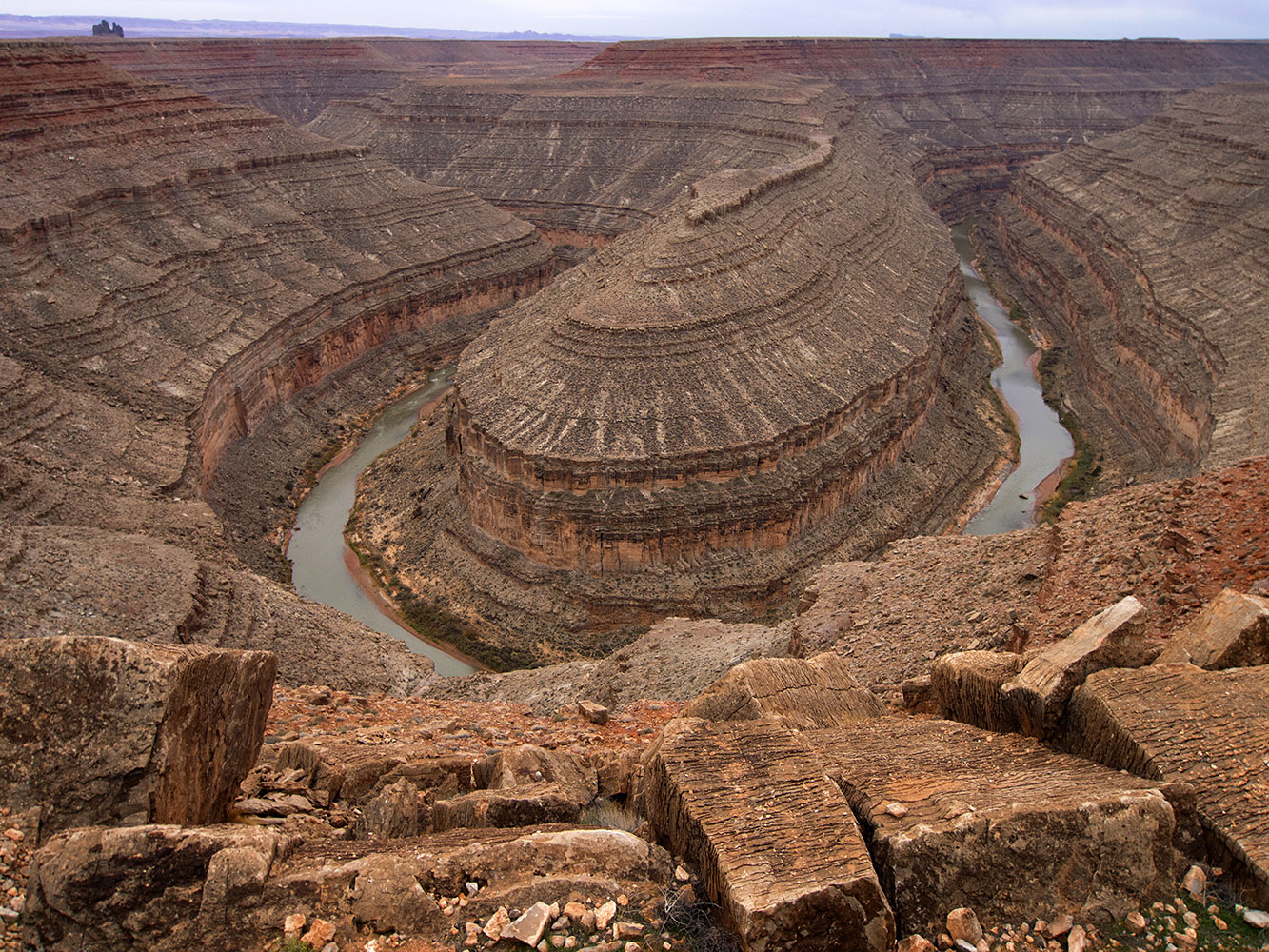 Goosenecks State Park, Utah.  Entrenched meanders of the San Juan River cut through fossiliferous limestone and shale from the Pennsylvanian period from 330 to 270 million years ago.