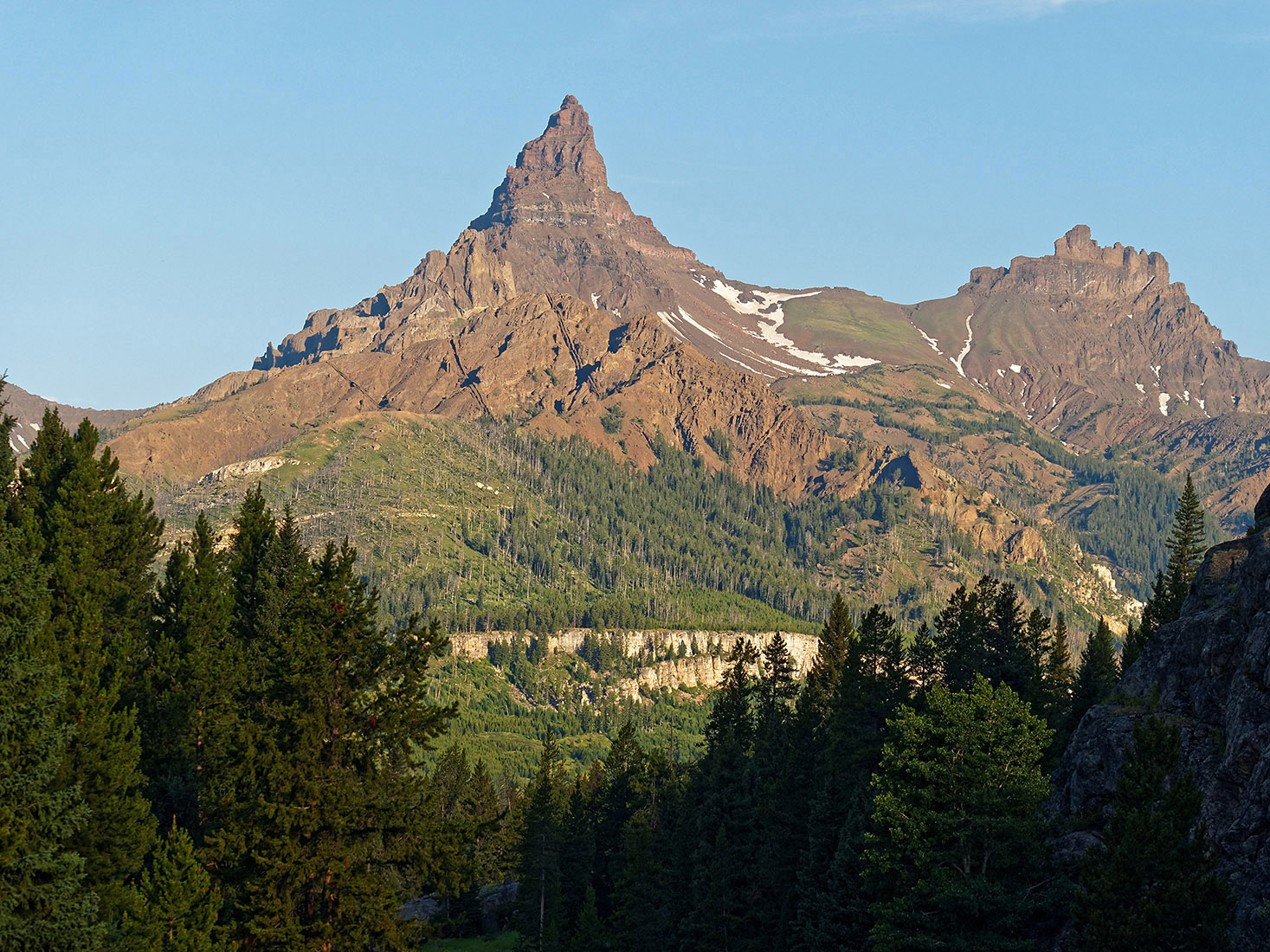 Closer view of Pilot Peak in the center.  Igneouw dikes that resist erosion form vertical bands in the mountain.