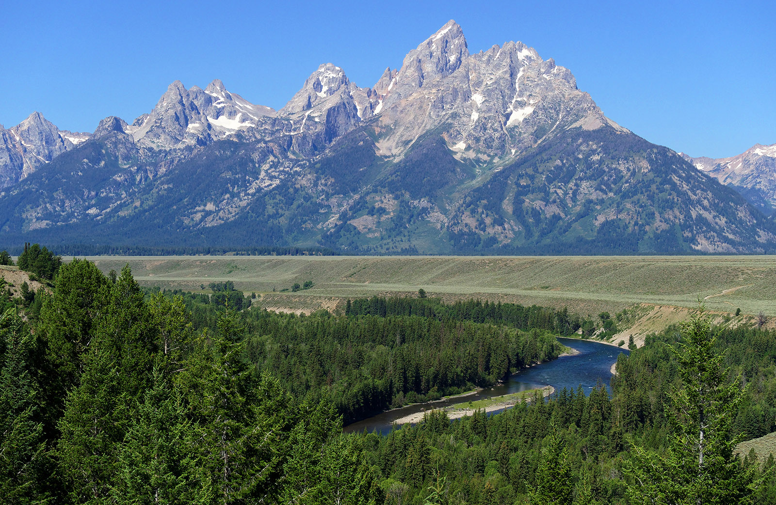 Snake River with Grand Tetons in background.  Snake River terraces are formed from glacial outwash gravels.