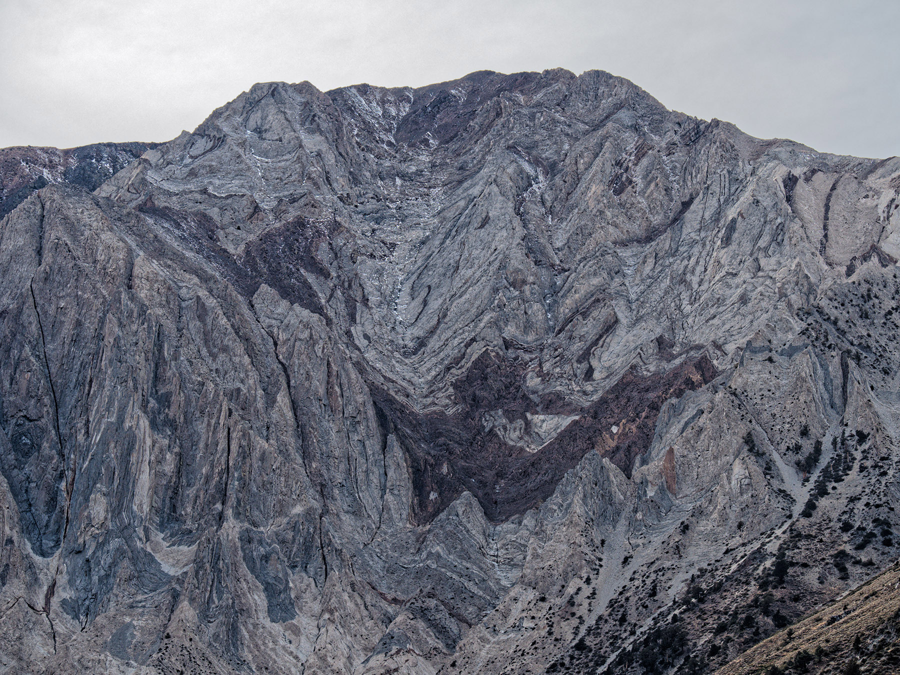 Detail of Laurel Mountain and Sevehah Cliff where metasedimentary layers were lifted and tilted vertical by rising magma.