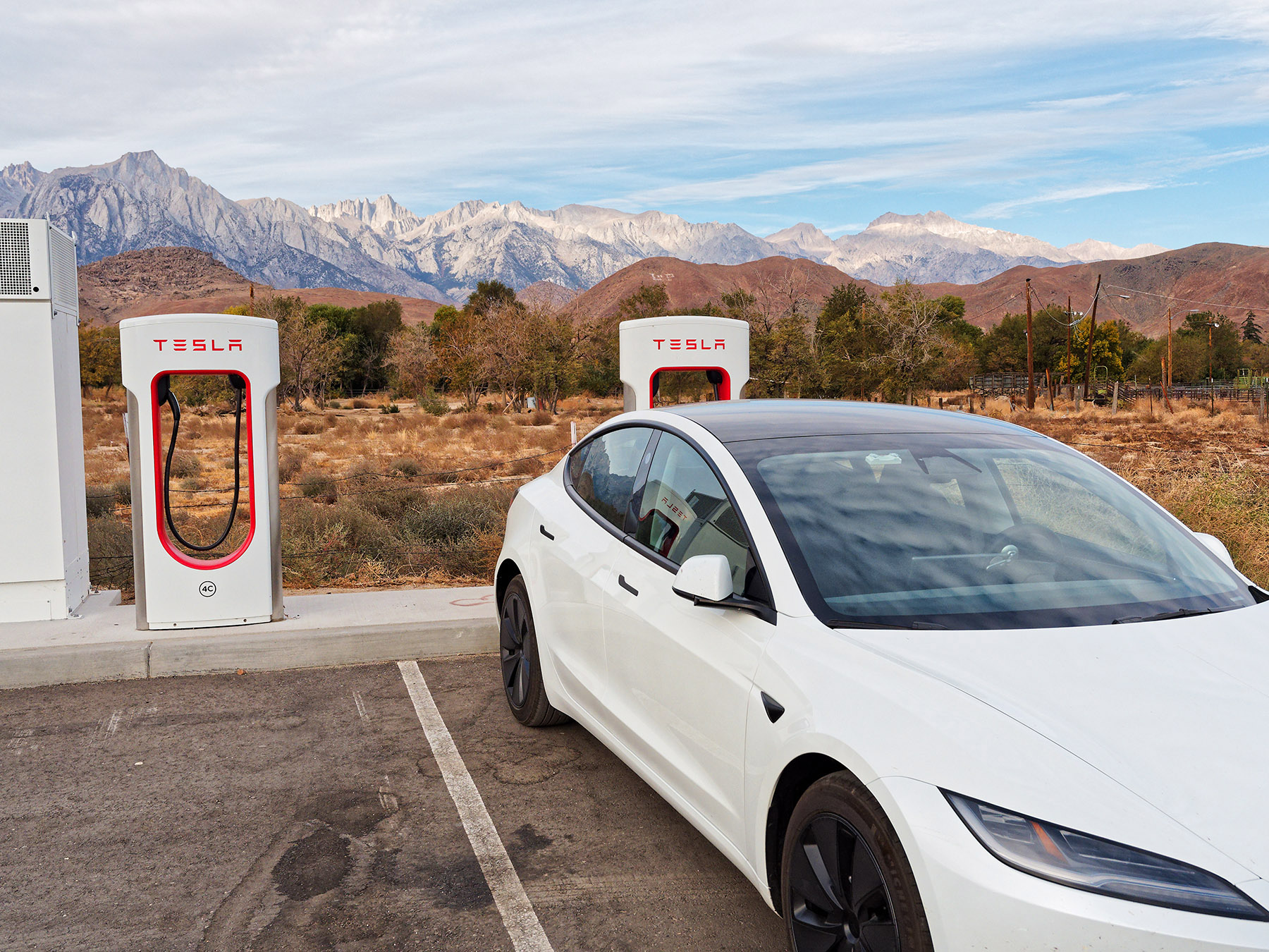 Charging at the Tesla Supercharger site offers a stunning view of Mt. Whitney.