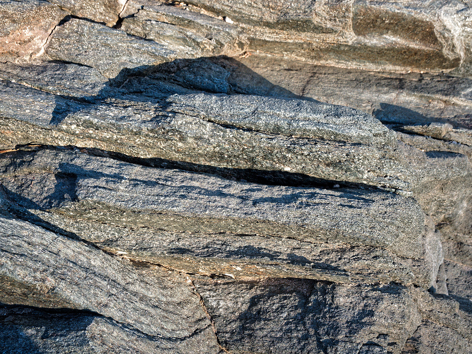 Detail of Orocopia Schist layers.  Sediments from the Farallon Plate were subducted and metamorphosed by heat and pressure beneath the North American Plate and then uplifted with parts of the overlying Proterozoic gneiss of the North American plate.