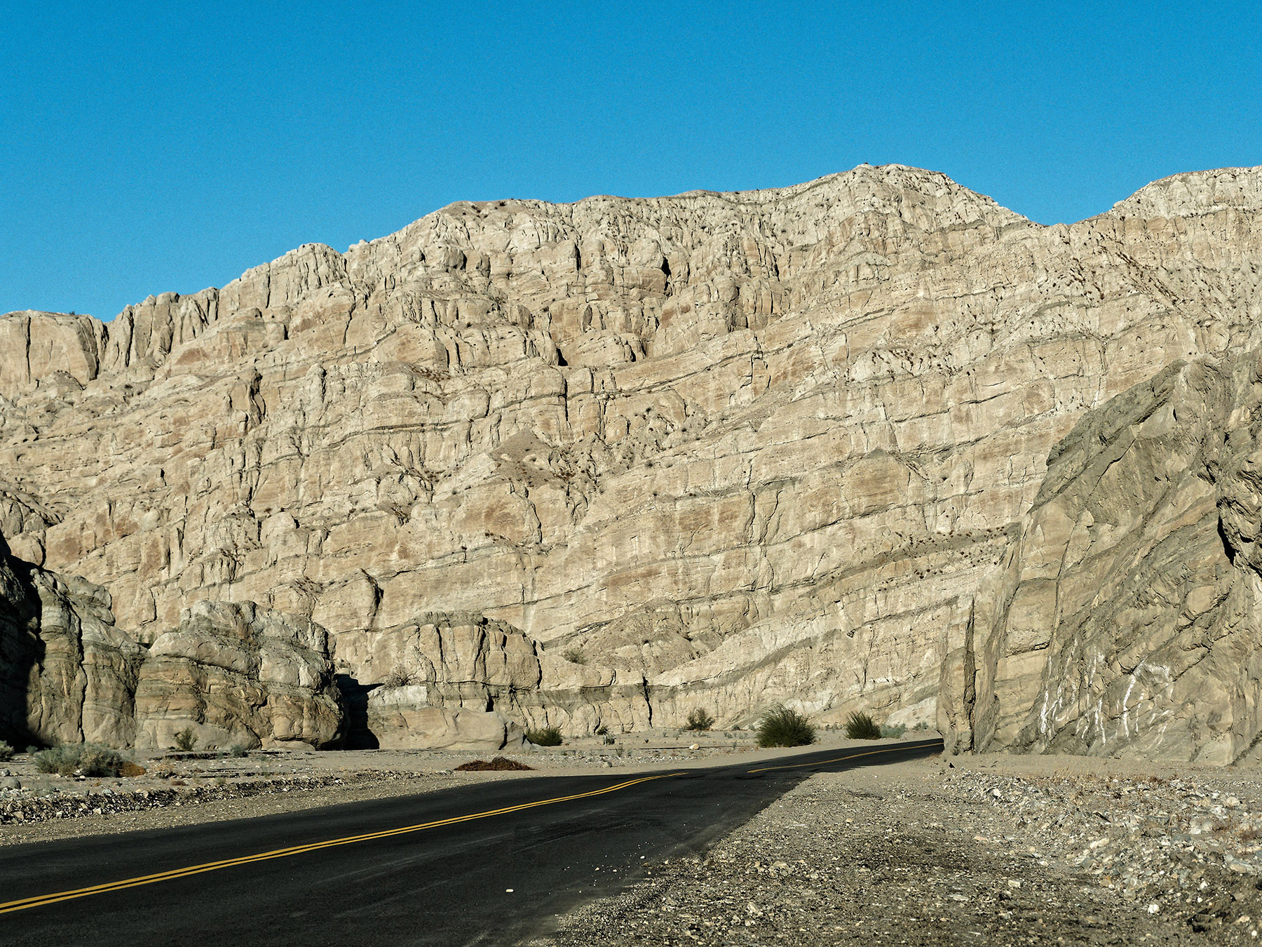 Layers of Palm Spring Formation sandstone and siltstone beds along Box Canyon Road.